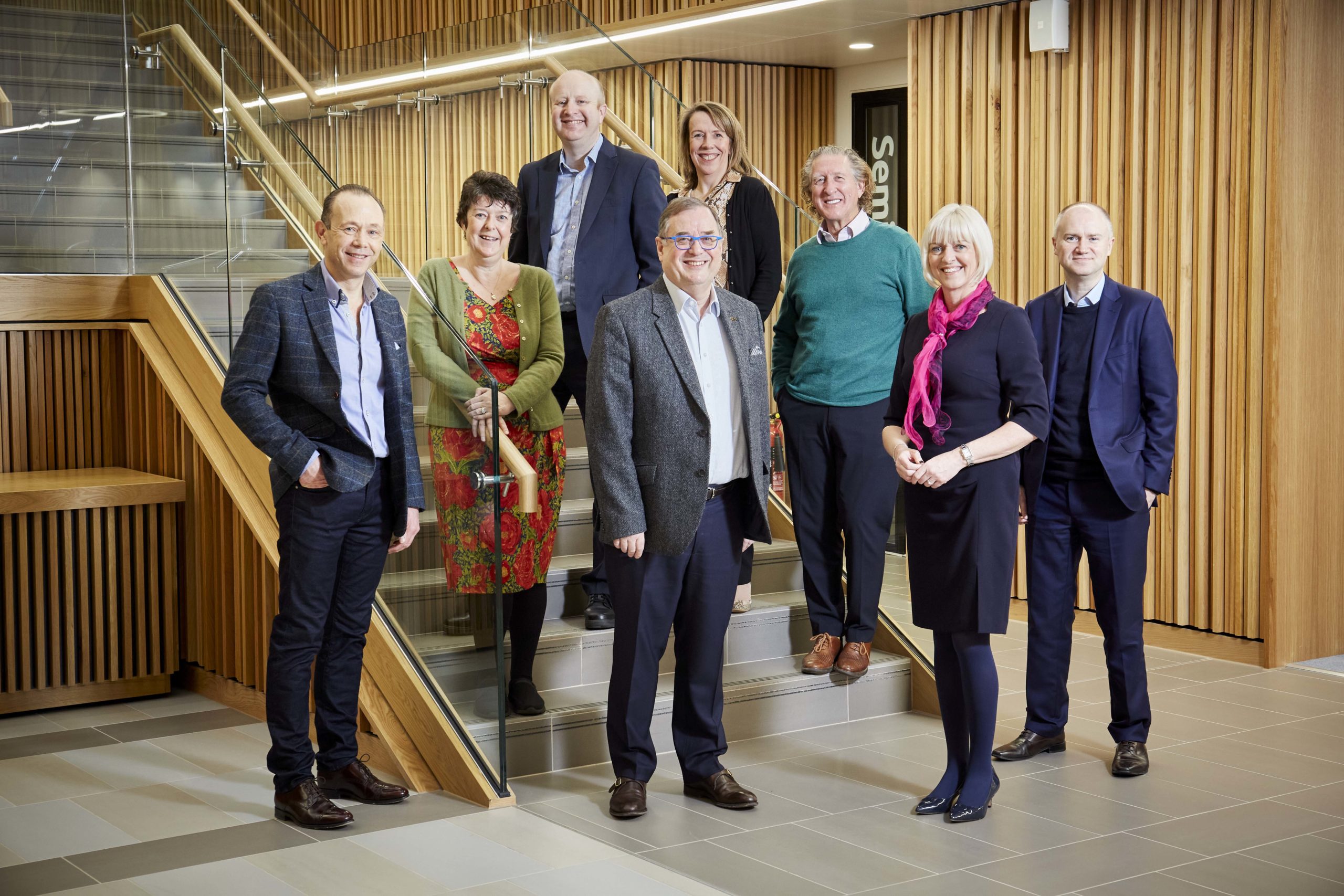 MIT REAP Team Leeds stood in a group on staircase in the Nexus building