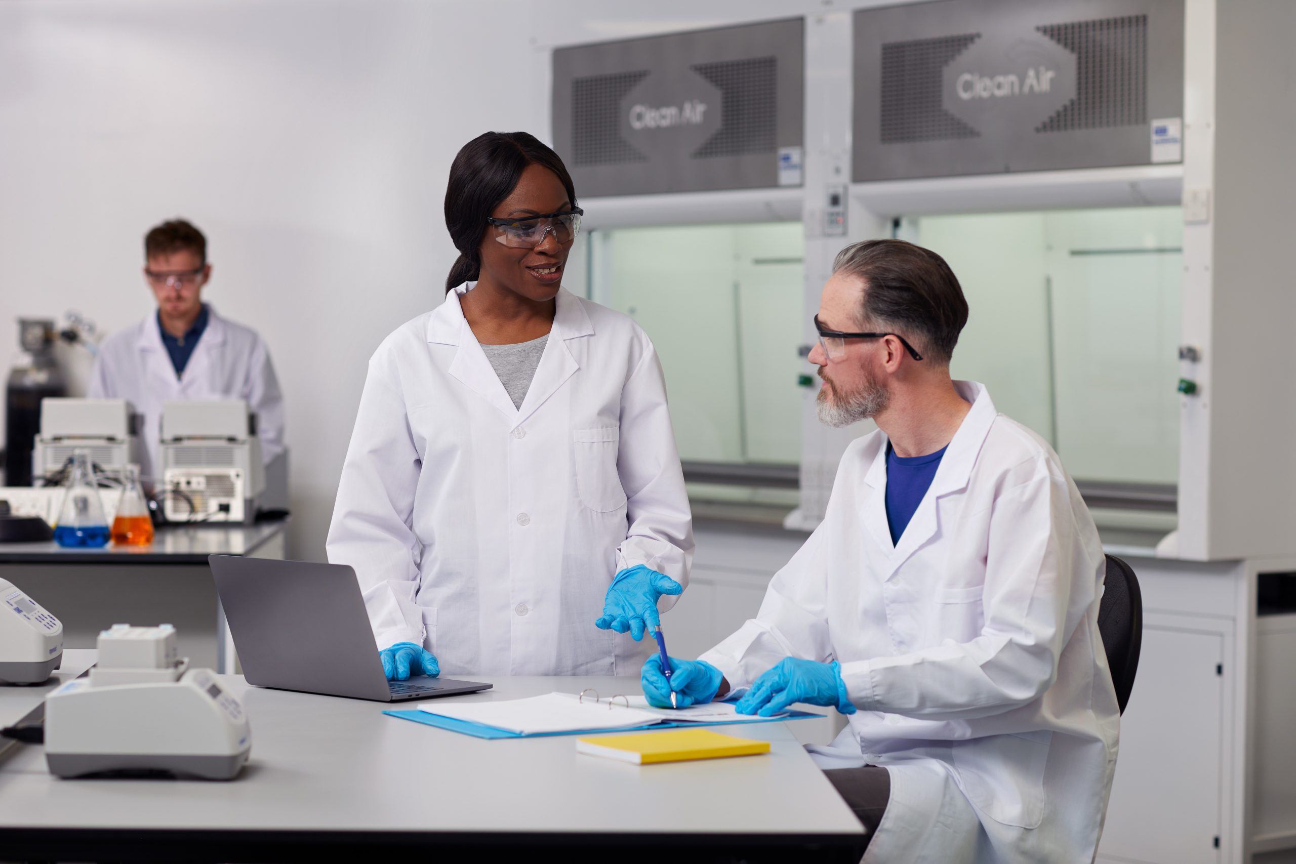 Three people working in the Nexus Innovation lab