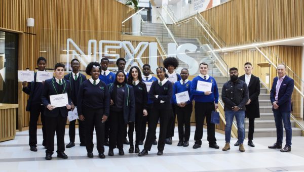 The students who took part in the Solution for Leeds challenge with the judging panel.
