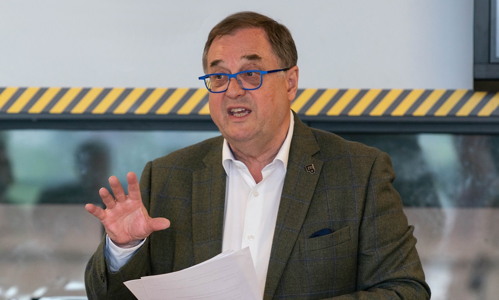 Head and shoulders shot of Sir Roger Marsh OBE DL, giving speech
