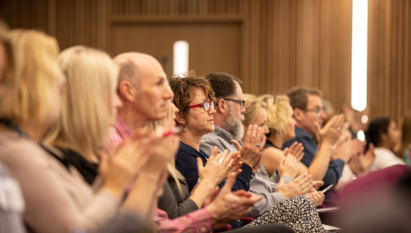 Audience clapping in Nexus theatre