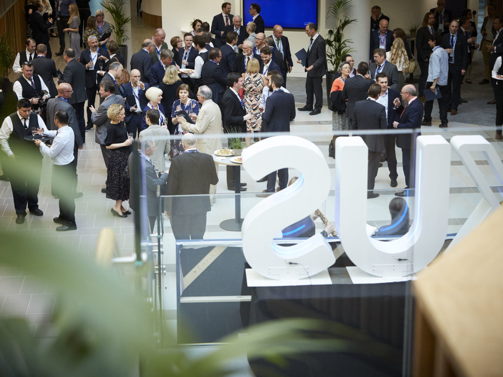 People netattending a networking event in the Nexus atrium