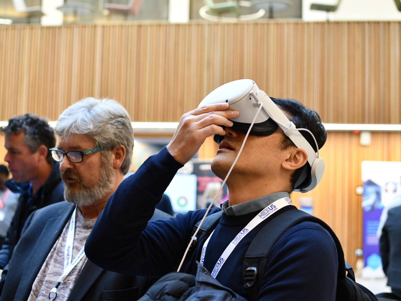 Man wearing a VR headset in the Nexus atrium