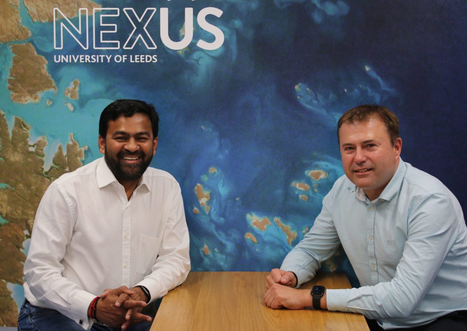 Itecho Health founders, Dr Adrian Brown and Lalit Suryawanshi smiling to camera.