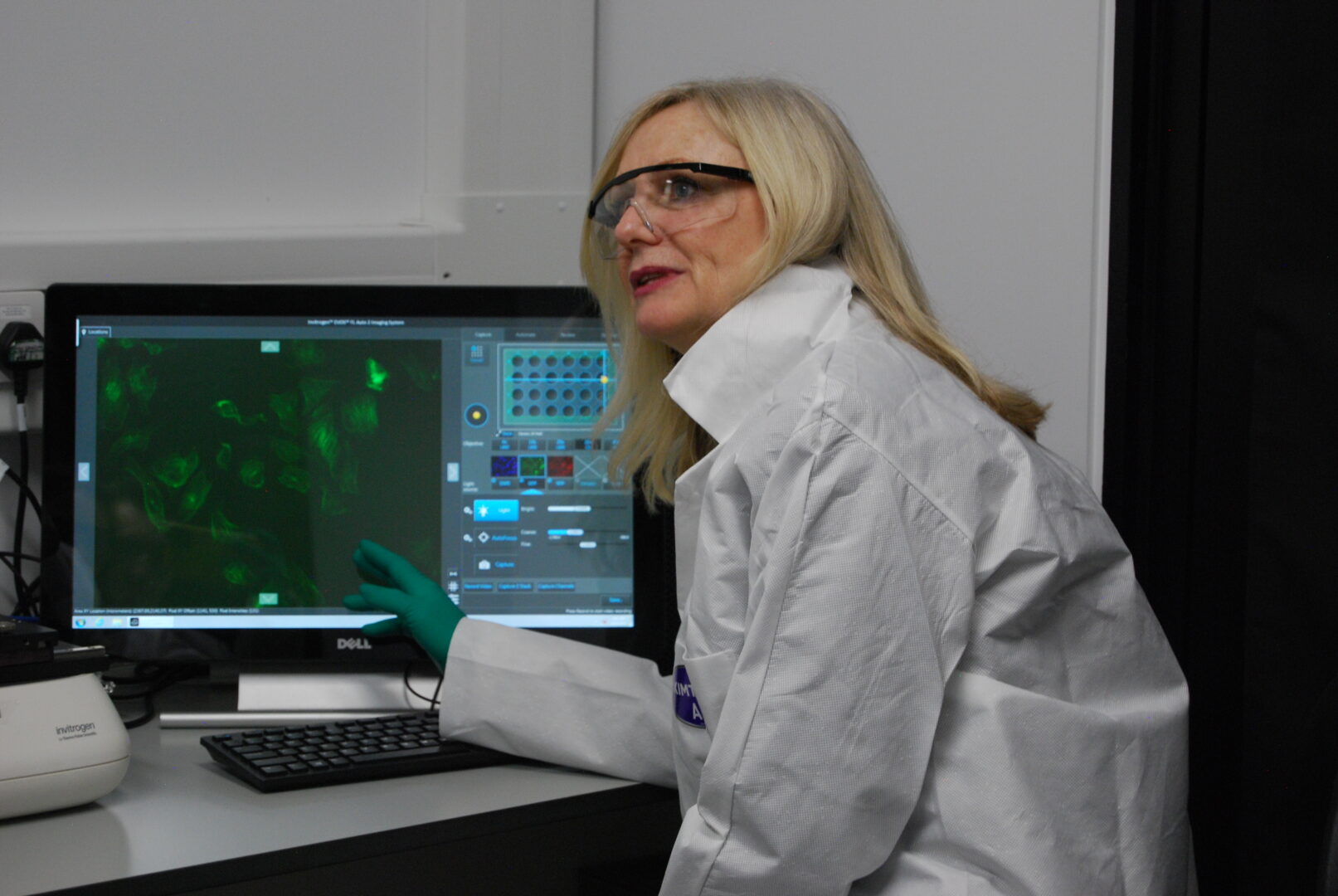 Scientist sitting at computer.