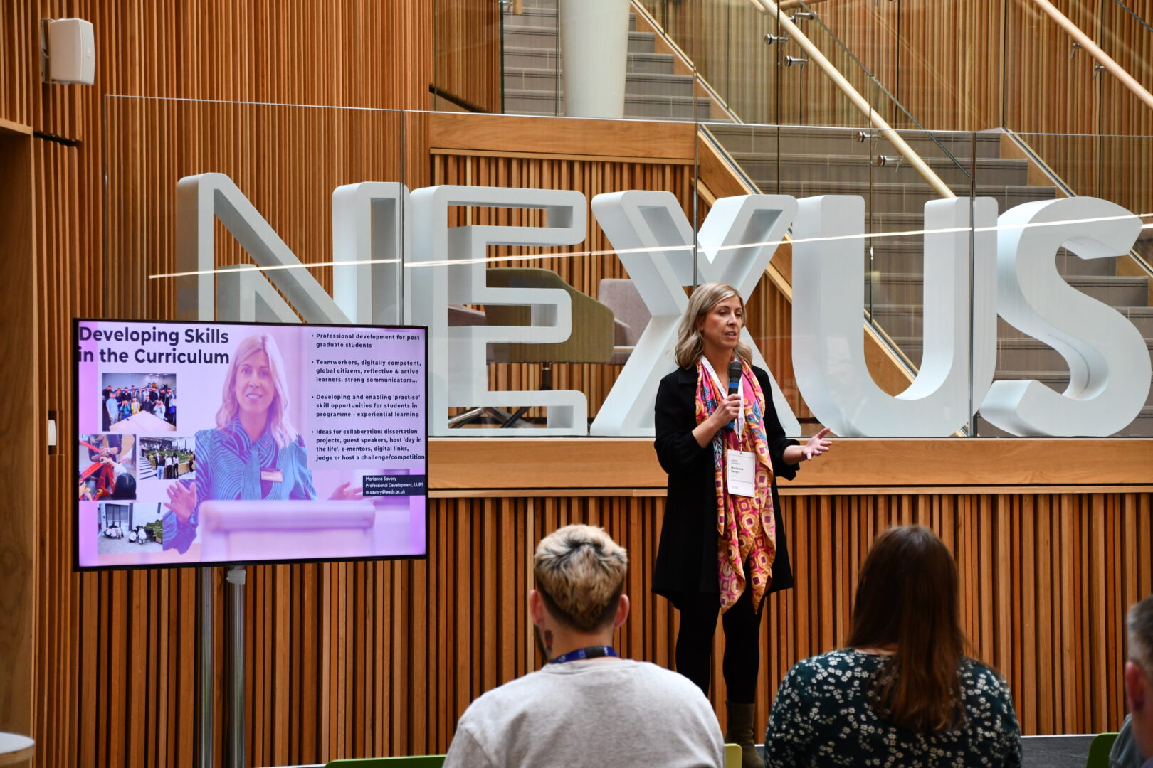 Speaker talking to the room at Nexus