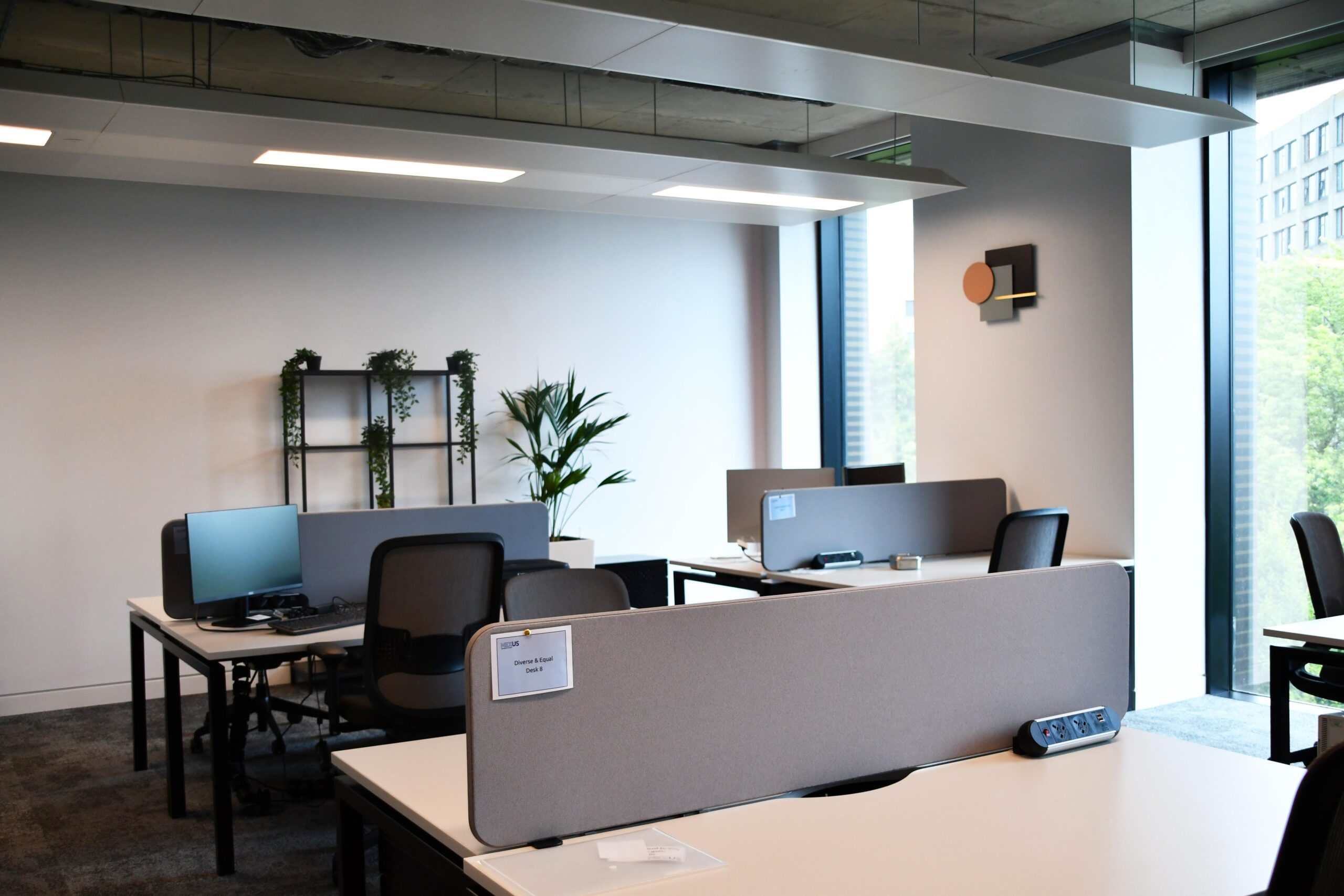 Private desk in co-working space.