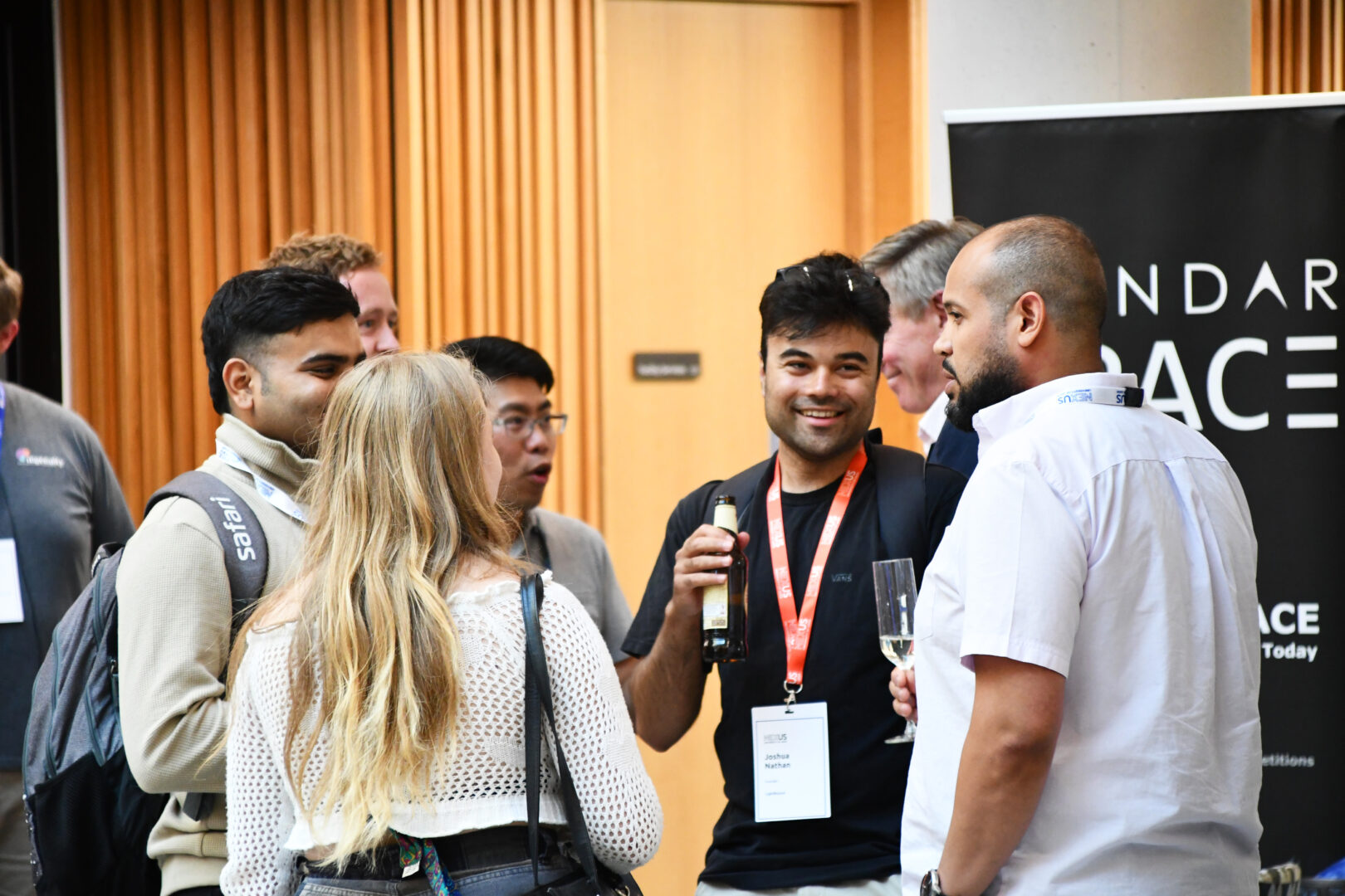 Five people chatting at Nexus Connect